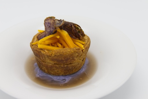 Pulled duck met pompoen en champignon